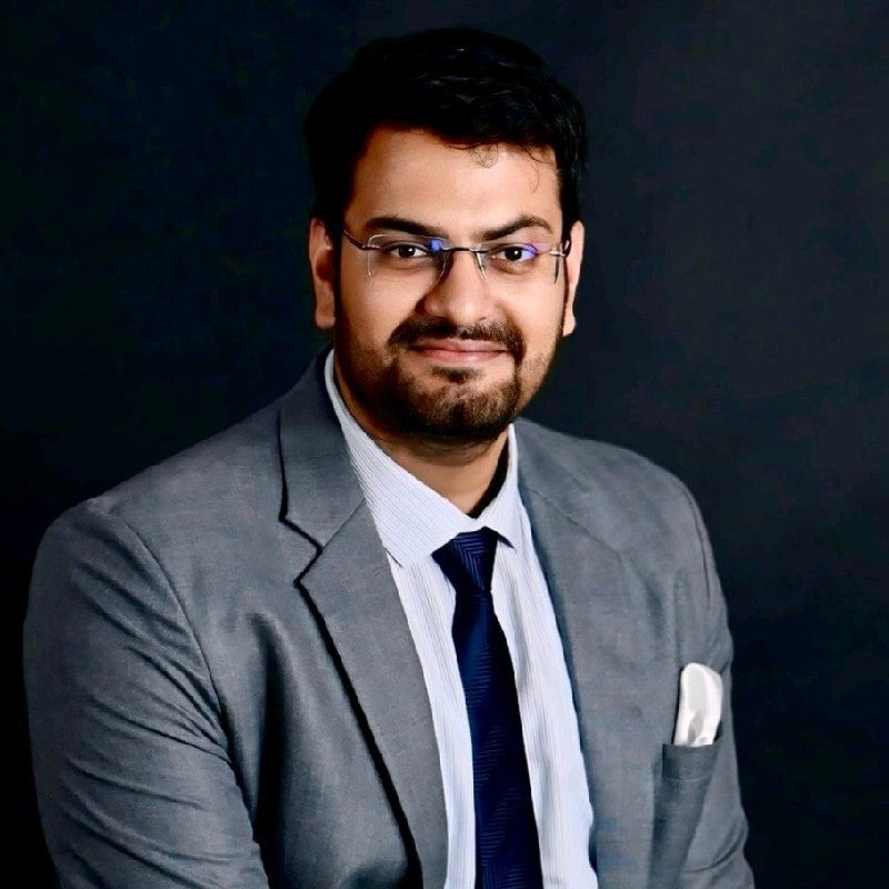 Dr. Vikas Aggarwal endorsing STIM Junior oral care